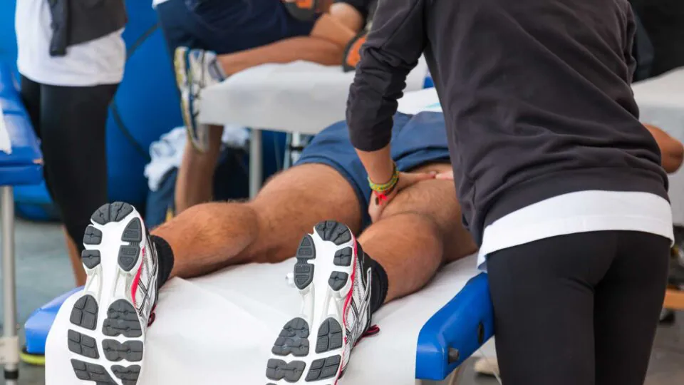 athletes relaxation massage before sport event, marathon muscles massage